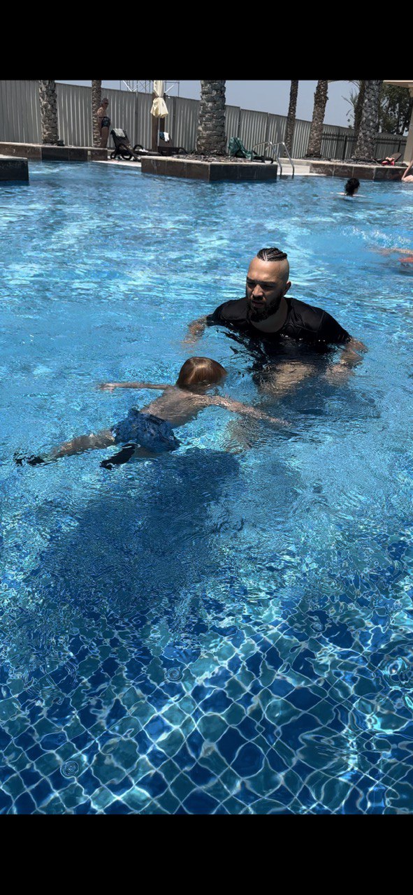 Toddler lesson at outdoor pool